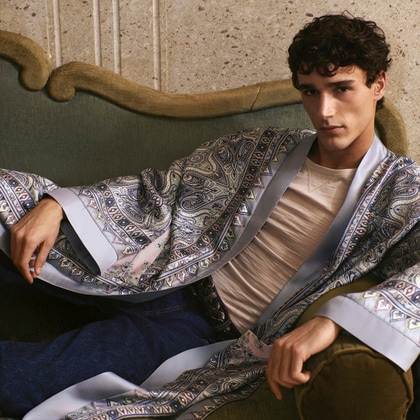 Model wearing Etro silk robe with placed pocket-square paisley print