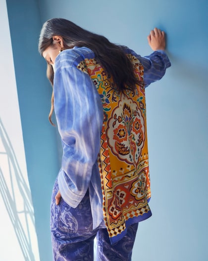 Model wearing a Etro Summer striped cotton shirt with silk detail
