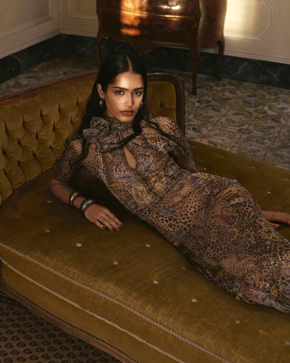 Model wearing Etro dress with animal print