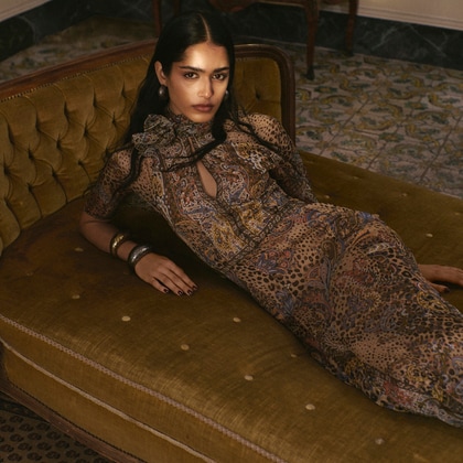 Model wearing Etro dress with animal print