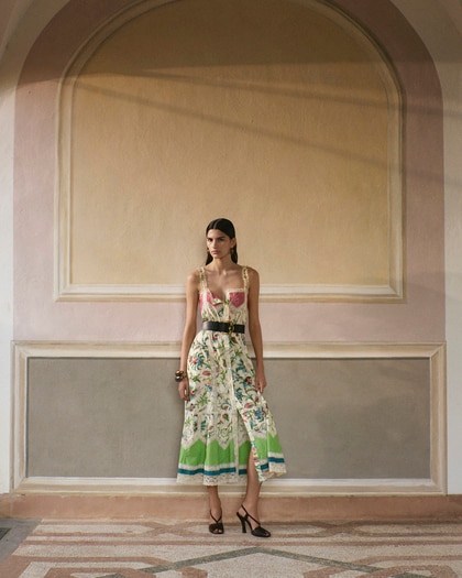 Model wearing an Etro cotton midi dress with lace inserts and floral motif