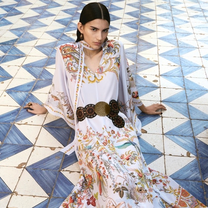 Model wearing a LONG SILK DRESS WITH SILK SCARF AND PLACED FLORA AND FAUNA PRINT