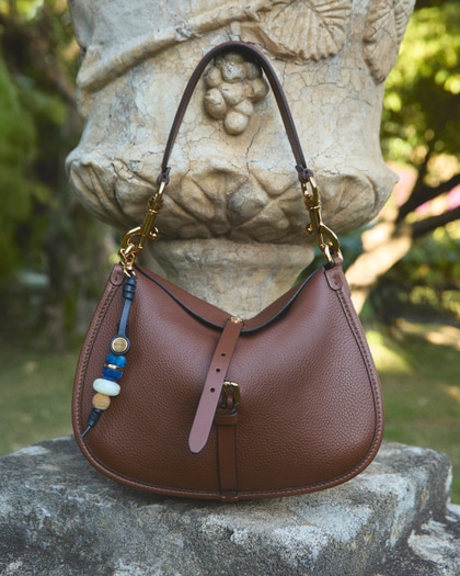 Etro Pony Bag in brown leather with a blue charm