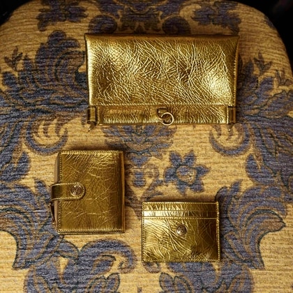 Etro gold laminated wallet, credit card holder and talk bag