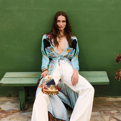 Model wearing Etro long kaftano and white jeans of Etro Summer