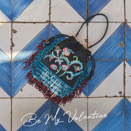 Etro Kalispera bag blue in raffia with text "Be my Valentine"