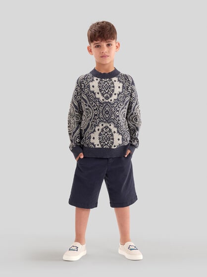 JUMPER WITH MEDALLION MOTIF