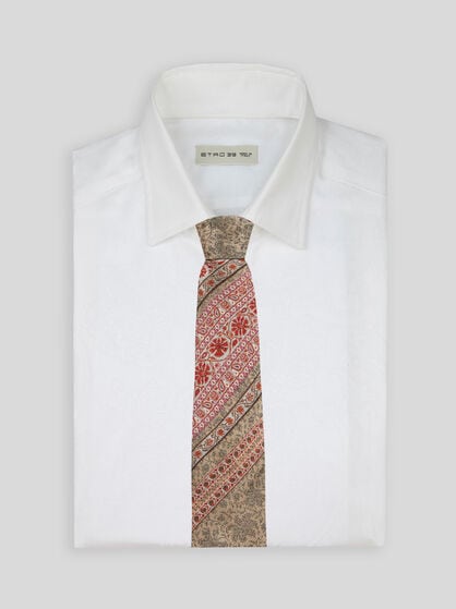 TIE WITH PLACED DESIGNS