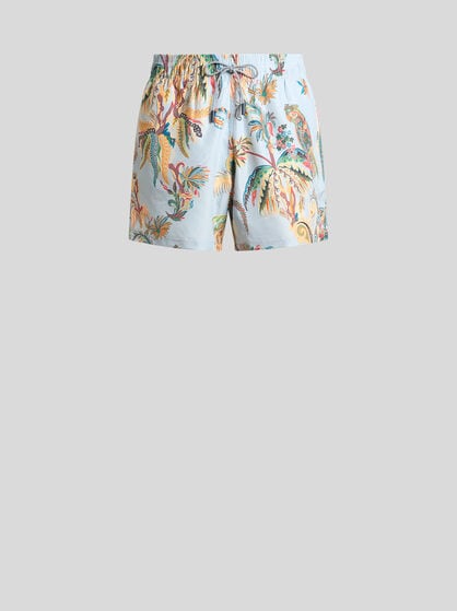 SWIM SHORTS WITH PLACED PARROT AND PALM TREE PRINT