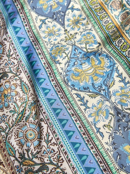 DOUBLE-PATTERN SWIM SHORTS