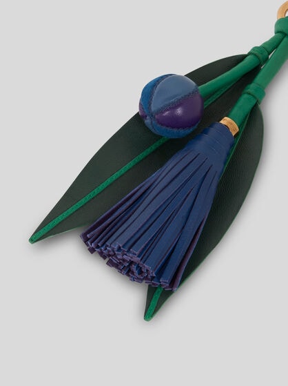 CHARM WITH TASSEL AND LEAVES