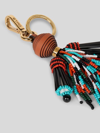 CHARM WITH MAN AND FRINGING