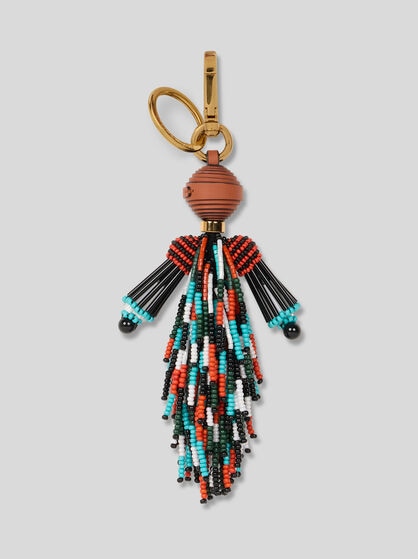 CHARM WITH MAN AND FRINGING