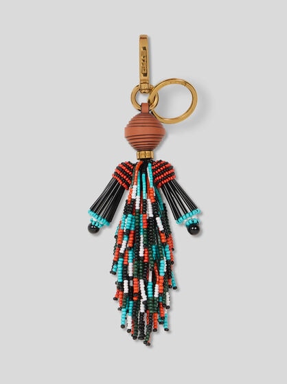 CHARM WITH MAN AND FRINGING