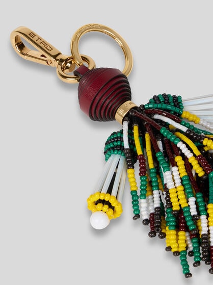 CHARM WITH MAN AND FRINGING