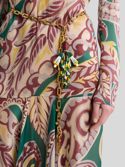 CHARM WITH MAN AND FRINGING
