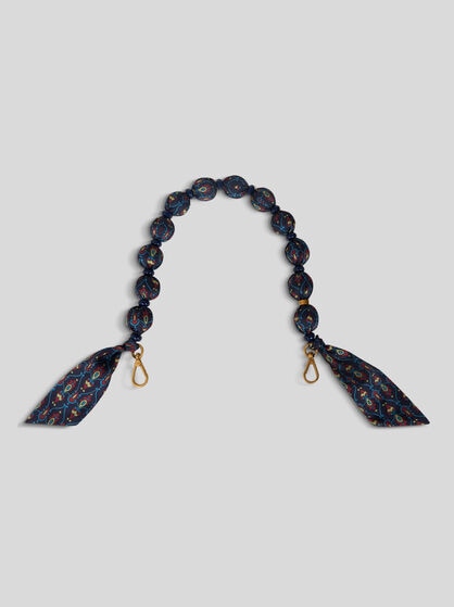 HANDLE WITH PRINTED FABRIC SPHERES AND BEADS