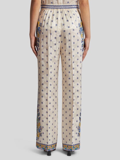 TROUSERS WITH MEDALLION MOTIF