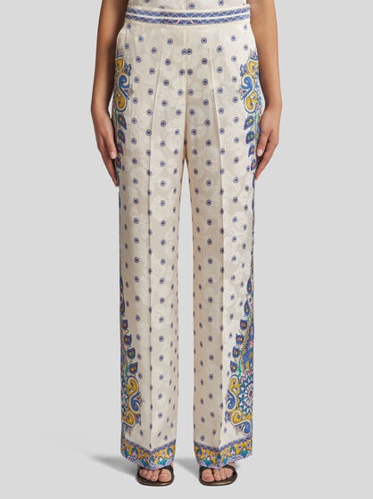 TROUSERS WITH MEDALLION MOTIF