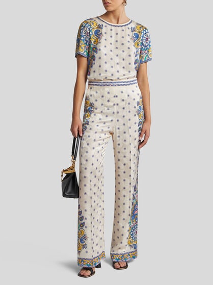 TROUSERS WITH MEDALLION MOTIF