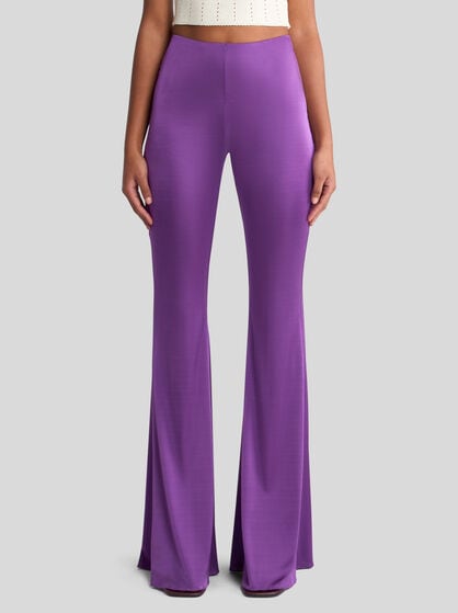 GLOSSY JERSEY FLARED TROUSERS