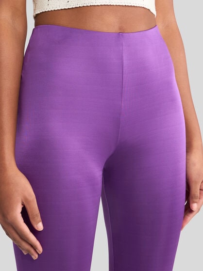GLOSSY JERSEY FLARED TROUSERS