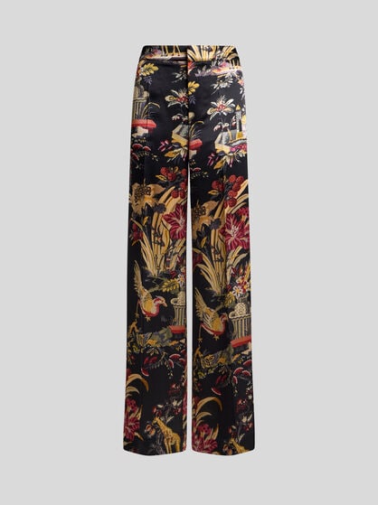PANTALONI IN ENVERS SATIN CON MOTIVO FIORI E ANIMALI