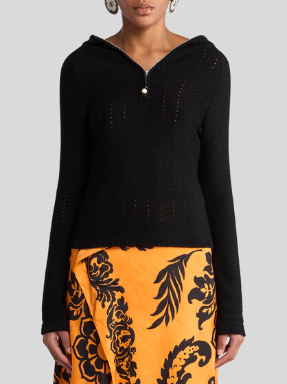KNIT TOP WITH HOOD AND PUNCHED DETAIL