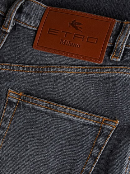 FLARED JEANS WITH PEGASO BUTTONS