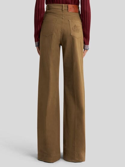 FLARED DENIM JEANS WITH PEGASO BUTTONS